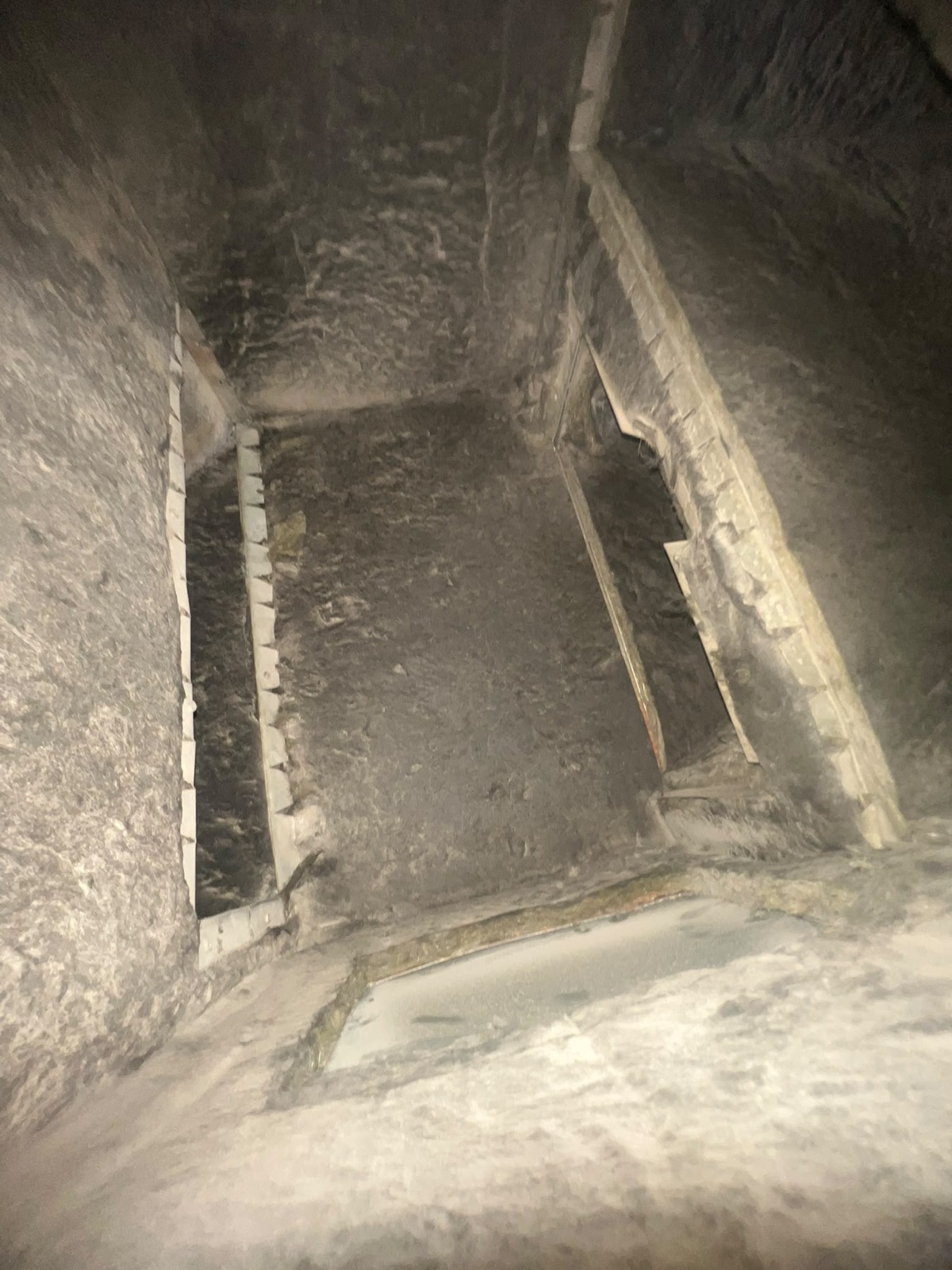 Dust buildup inside an air duct documented during an R1 inspection in the DFW area